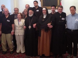 joining hands with Mother Agnes and the Melkite Patriarch in Damascus