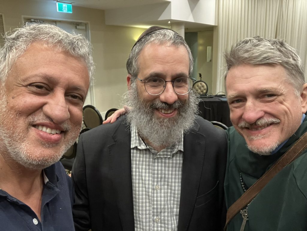 with friends at the interfaith seminar - Abbas Ali and Rabbi Zalman Kastel
